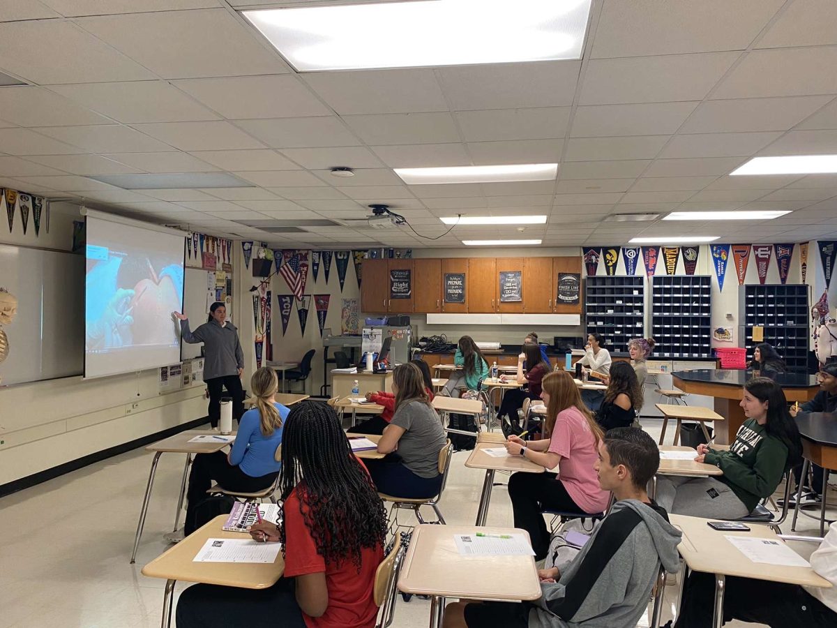 Sylvia Tanious teaches her sixth period medical terminology class through video presentation on Sept. 19 (photo courtesy of Anna Tegtmeier 24). 