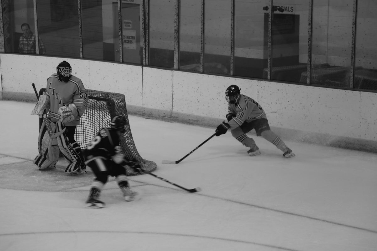 Liam Lecauchois ‘24 defends Wheaton West player in an away game on Oct. 16.