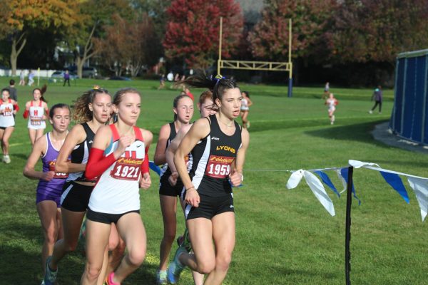 Julianne Melby ‘24 leads pack of runners at Regional meet on SC course (Garrity/LION)
