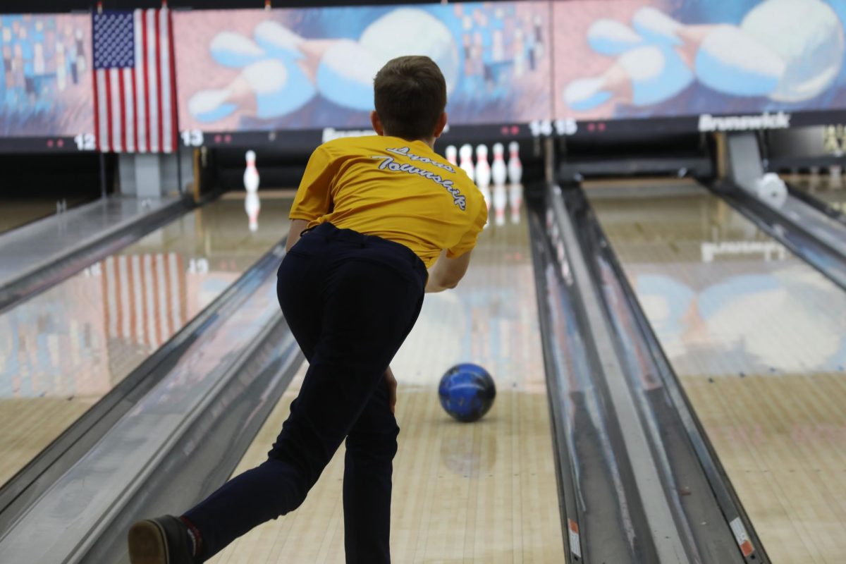 
Bart Koszut ‘26 executes a strike at Rolling Lanes against at Lake Park High School (Klaczynski/LION). 
