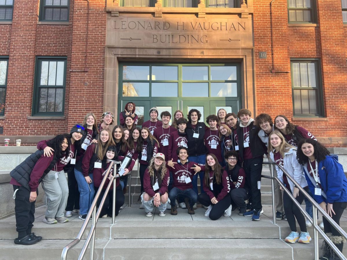 Snowball staff posing for photo outside of the Vaughan building before leaving for fall retreat (photo courtesy of Snowball Facebook account). 