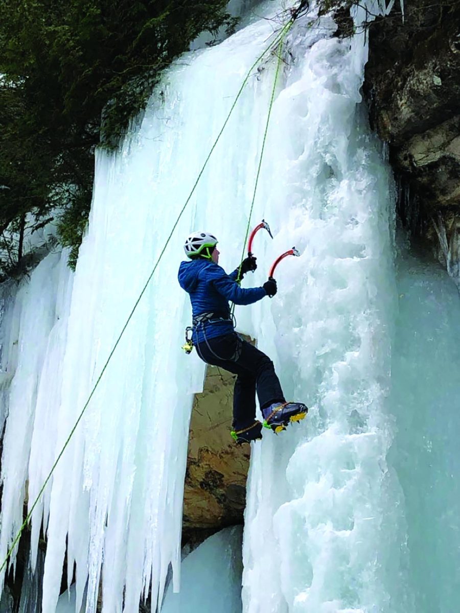 Poppy Graber ‘24 scales a frozen waterfall (photo courtesy of Poppy Graber).