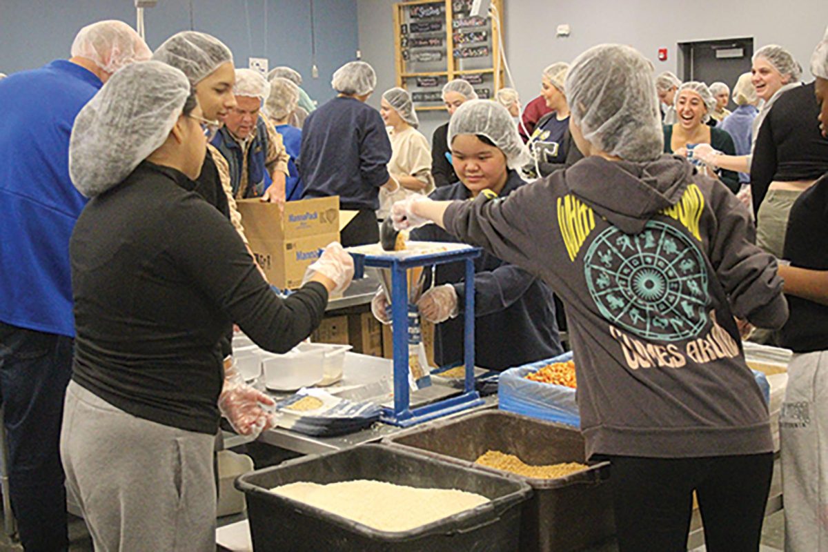 LT volunteers package aid meals at Pack for Impact event on Jan. 20 at Feed My Starving Children in Schaumburg (Moran/LION). 