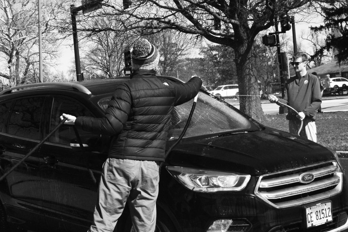 Participants hold carwash on marc 10 to raise money before performances (Hepokoski/LION).
