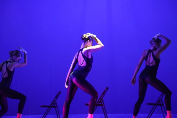 Eurythmic Dancers strike a pose under the lights during jazz dance “Go On, Girl,” choreographed by Kayla Lovelace ‘24 and Brooke Walsh ‘25, (Ludden/LION). 

