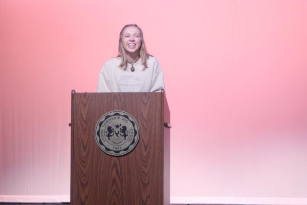 Ava Armstrong 24 rehearses her speech for Baccalaureate hosted in NC Reber Center on May 19 (Davis/LION). 