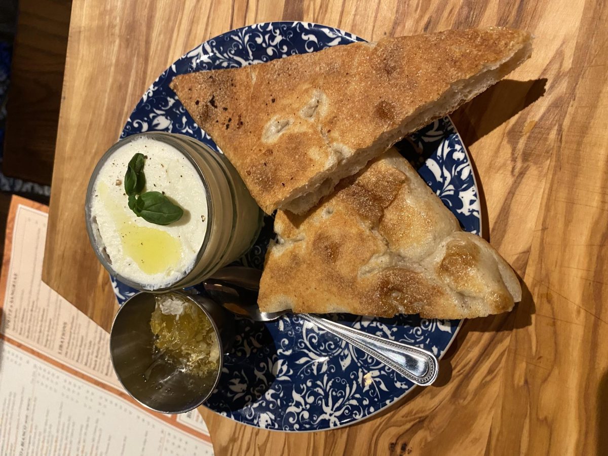 The honey comb and ricotta toast appetizer from Ellas Italian Pub (Hepokoski/LION). 