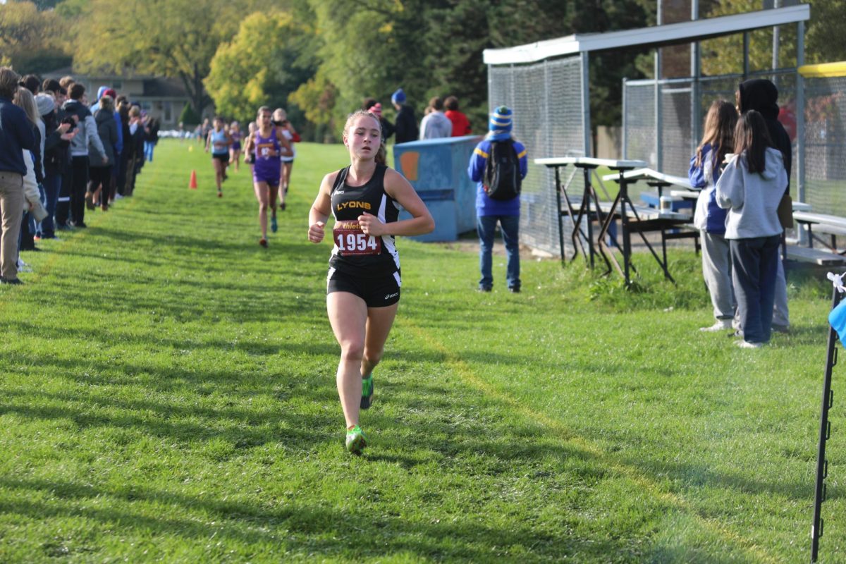 Kristina and Madison Findley 24 competing in the Regional cross country meet at SC on Oct. 21 (Garrity/LION).