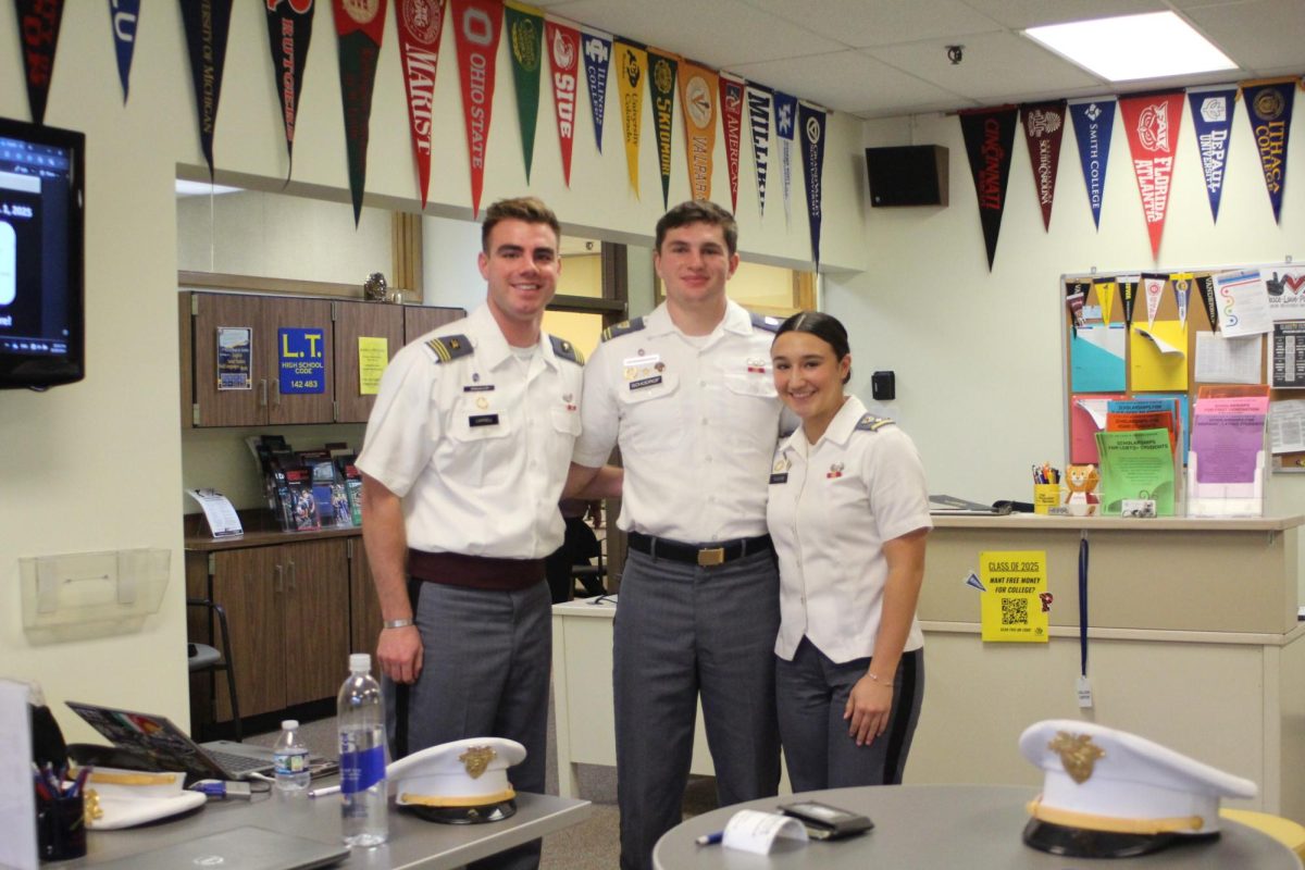  Cadet Kayla Teuscher and LT alumni and Cadets Benjamin Campbell ‘21 and Cooper Schodrof ‘22 pose for picture on Nov. 25 at NC room 148.
