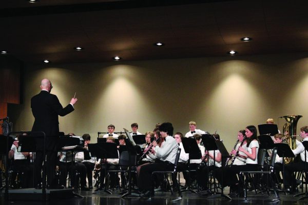 Photo caption: Band students perform on stage in the Reber Center during the Spring Concert on April 16

