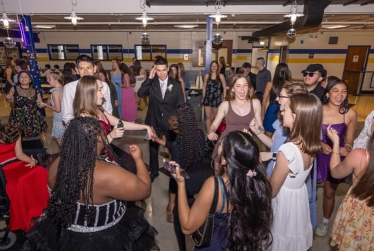 Best Buddies Prom attendees dancing at an annual event (photo courtesy of Basic)