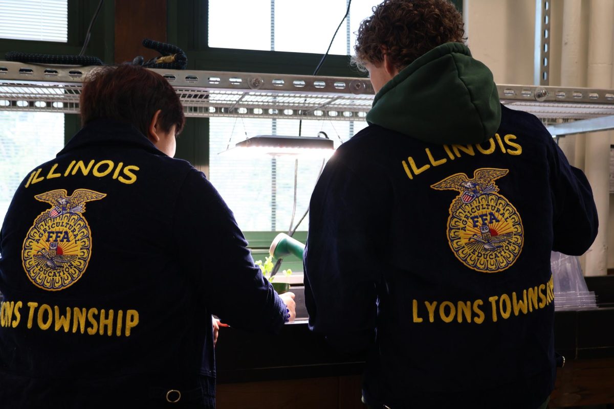 Members of FFA plant spinach in preparation for the club meeting on Sept. 18 (Stack/LION). 