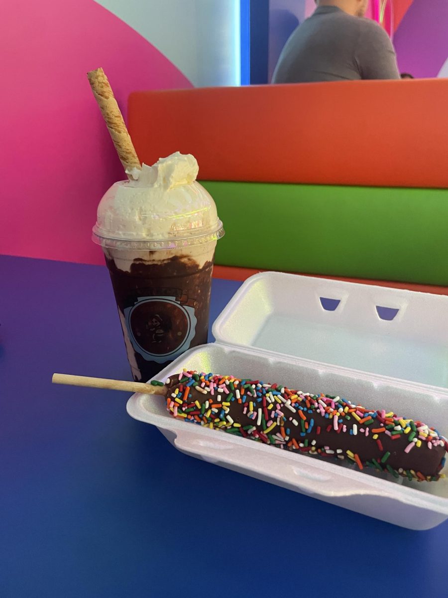 The chocolate milkshake topped with cream and rainbow sprinkled choco banana (Ludden/LION). 