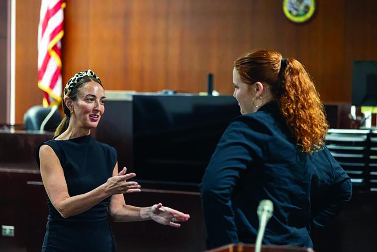 Township of Lyons intern Zoe Knott ‘24 stands with clerk Elyse Hoffenberg as they have a discussion about the program on Aug. 15 (photo courtsey of Sean Kirchman). 