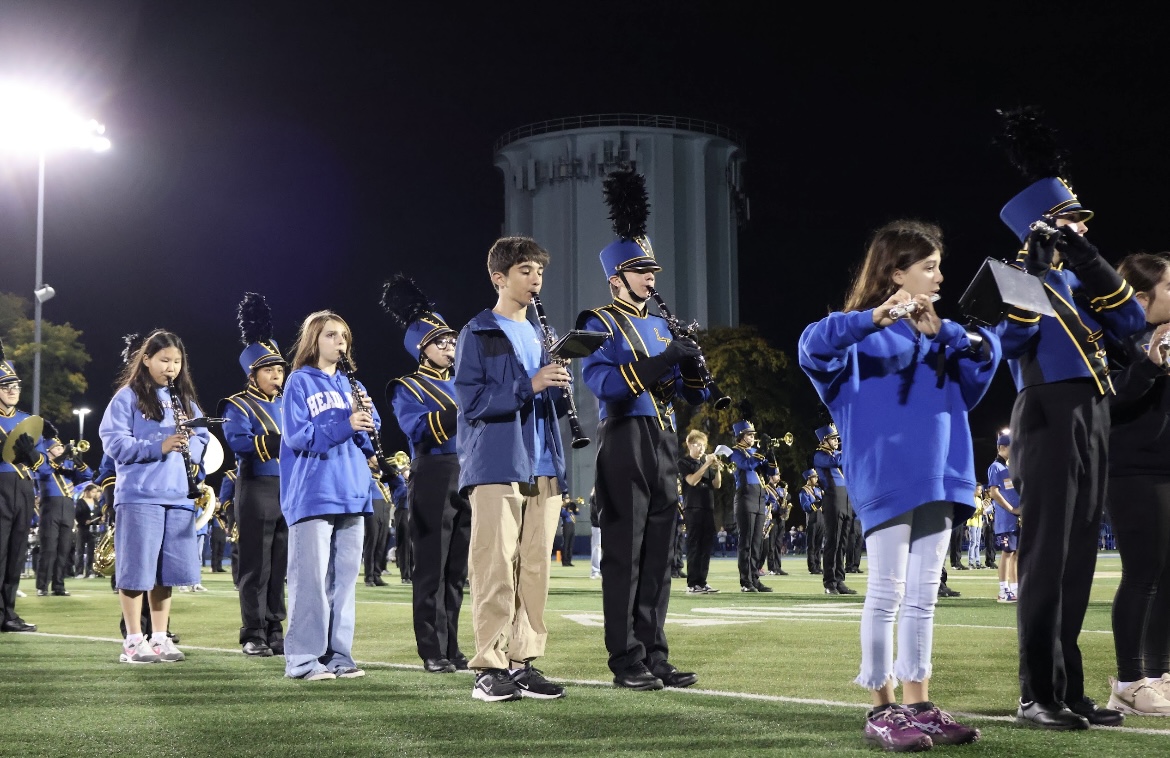 Marching band pairs with junior high on Oct. 17 ‘Salute to Service’ football game (Stack/LION).