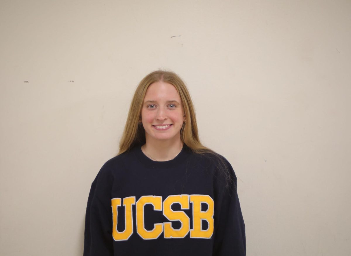 Maeve Collins ‘26 smiles for the camera wearing her University of
California at Santa Barbara sweatshirt (Pansing/LION).
