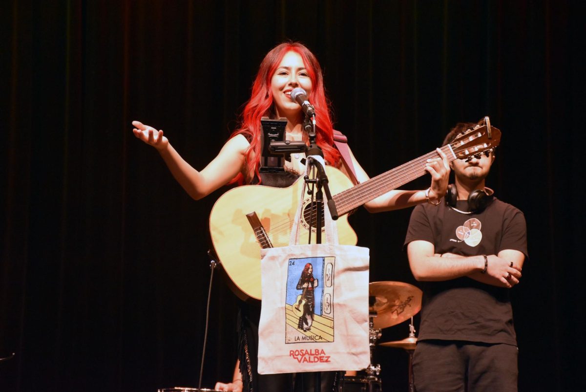 Singer Rosalba Valdez performs with her guitar in NC
Reber Center for the Oct. 3 celebration (Brooks/LION).