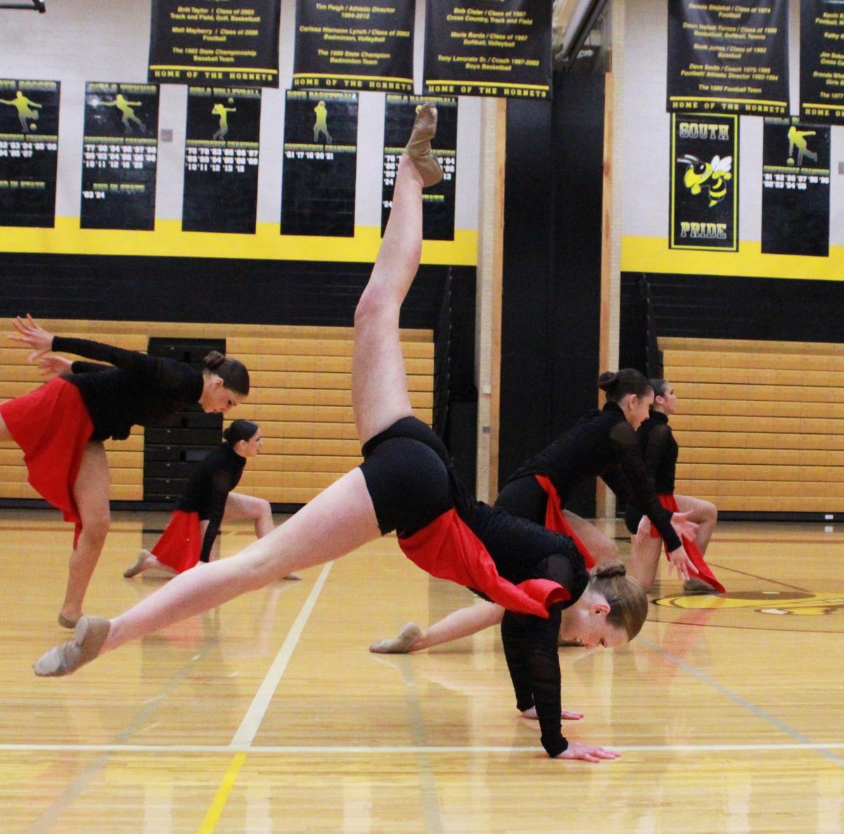 
Maeve McCormack ‘26 kicks her leg up rhythmically during the Conference performance on Jan. 19 (Simmons/LION).

