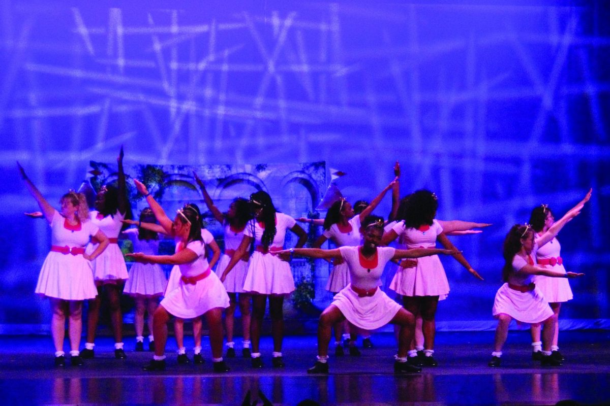High school step team Stepping Foxes performs a Super Mario themed step routine while dressed as Princess Peach on the Reber stage (Barcelona/LION).
